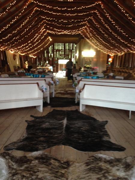 Sara and Eric brought cowhide rugs from home, setting off the bridal aisle perfectly!