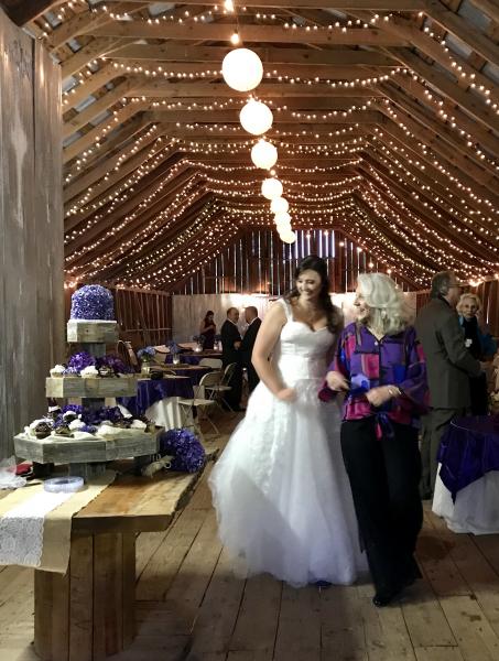 Purple hydrangeas were beautifully featured in mason jars lit up with submersible tea lights.